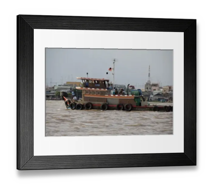 Framed Print : Vietnam, Ho Chi Minh City (aka Saigon). Delta port town of My Tho, views along Framed Print : Vietnam, Ho Chi Minh City (aka Saigon). Delta port town of My Tho, views along