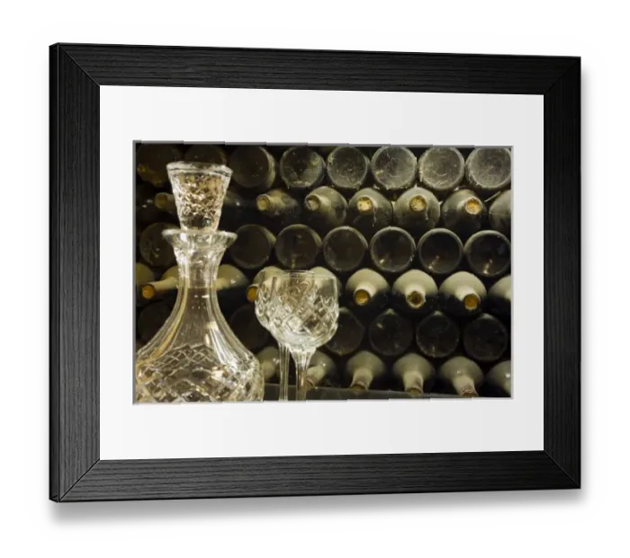 Framed Print : Australia. Crystall decantor and glasses in front of dust-covered bottles Framed Print : Australia. Crystall decantor and glasses in front of dust-covered bottles