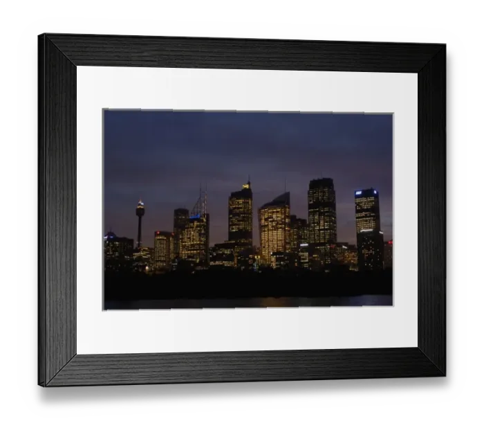 Framed Print : Sydney skyline at night with the Sydney Harbour in the foreground. Sydney. NSW. AUSTRALIA