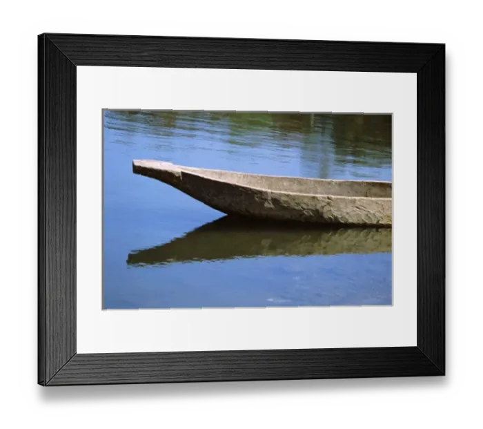 Framed Print : Africa, Zambia, Zambezi River. Dugout canoe