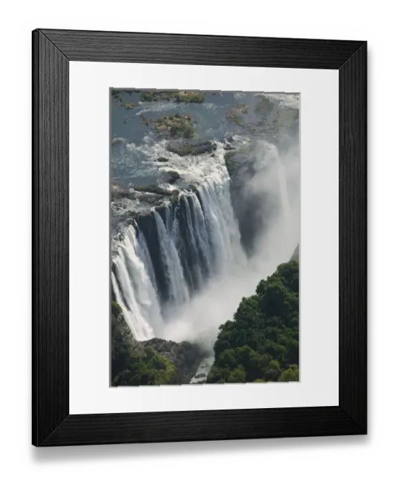 Framed Print : Zambia, Mosi-Oa-Tunya National Park. Aerial view of Zambezi River flowing over Victoria Framed Print : Zambia, Mosi-Oa-Tunya National Park. Aerial view of Zambezi River flowing over Victoria