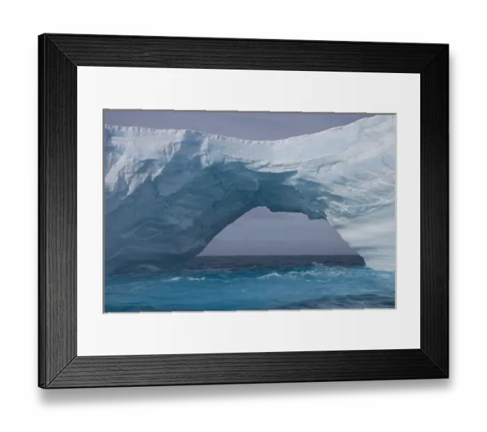 Framed Print : UK Territory, South Georgia Island, Iris Bay. Bridge and arch formed on an iceberg