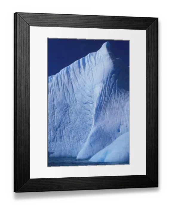 Framed Print : Antarctica, Deception Island, Morning sun lights blue iceberg near Baily Head in