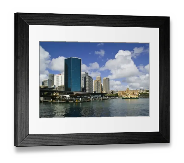 Framed Print : Australia, New South Wales (NSW), Sydney. Tall Buildings along the ferry piers of Sydney Cove