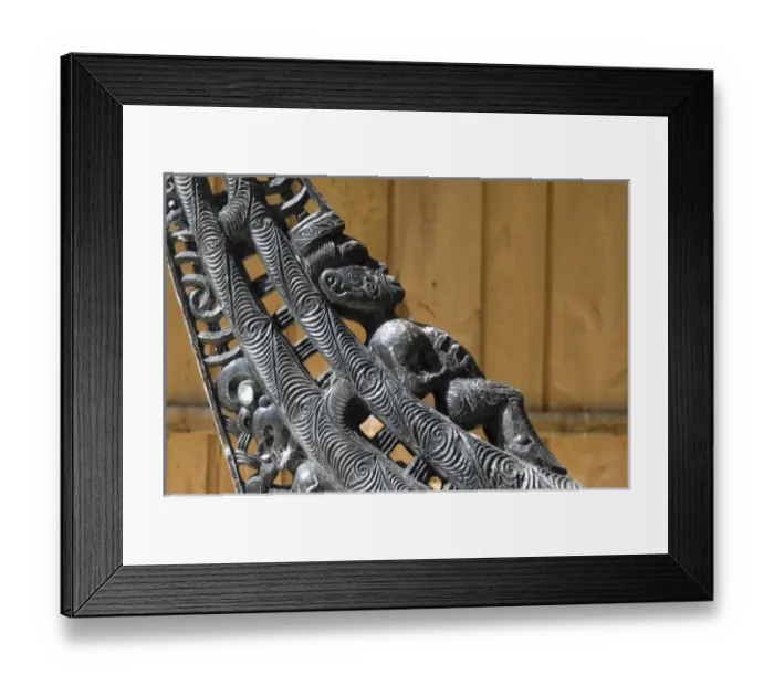 Framed Print : New Zealand, South Island, Oakins Bay. Wood carvings on a traditional Maori canoe Framed Print : New Zealand, South Island, Oakins Bay. Wood carvings on a traditional Maori canoe