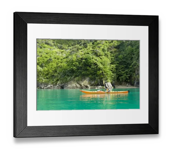 Framed Print : New Zealand, South Island, Marlborough Sounds. Jen Ebel sea kayaking. (MR)