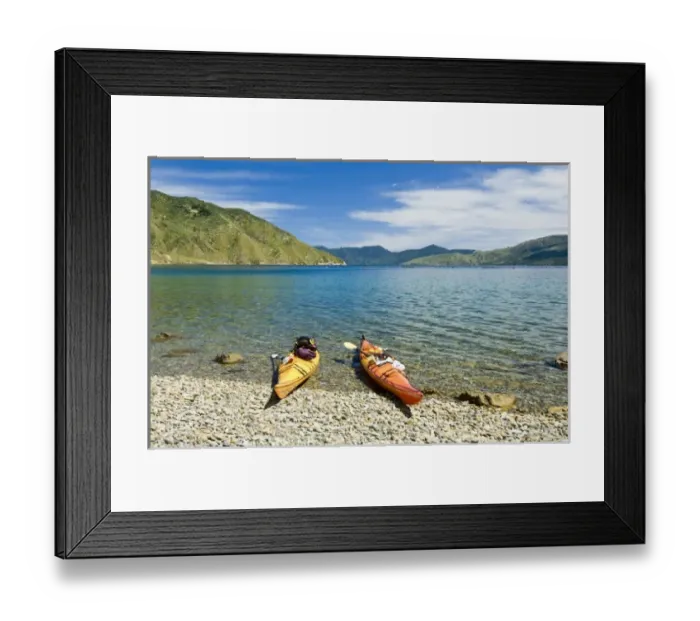 Framed Print : New Zealand, South Island, Marlborough Sounds. Sea kayaks on beach at Tawhitinui Reach