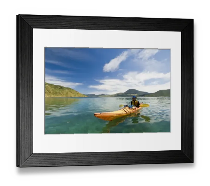 Framed Print : New Zealand, South Island, Marlborough Sounds. Sam Robinson sea kayaking. (MR) Framed Print : New Zealand, South Island, Marlborough Sounds. Sam Robinson sea kayaking. (MR)
