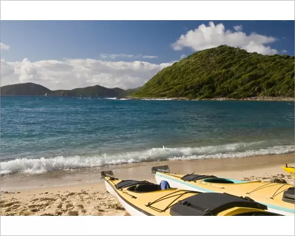 UK, British Virgin Islands, Peter Island, White Bay. Kayaks hauled out on beach