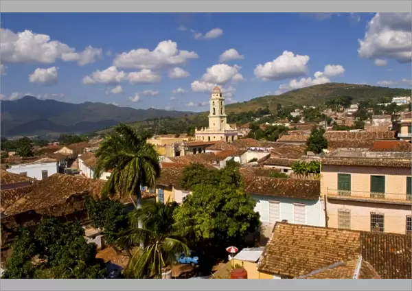 View from above with great clouds of the old Colonial village of Trinidad Cuba buildings