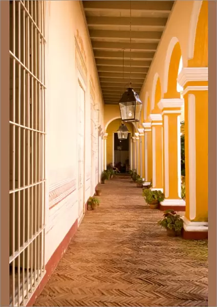 Old home pillars and hall of once expensive house in Trinidad Cuba