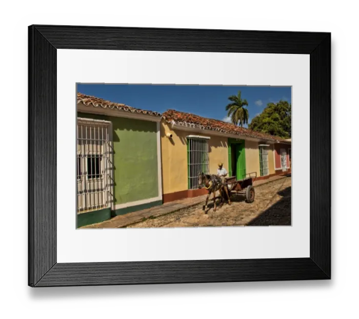 Framed Print : Beautiful homes in Colonial city of Trinidad Cuba with man riding horse cart on cobblestone Framed Print : Beautiful homes in Colonial city of Trinidad Cuba with man riding horse cart on cobblestone
