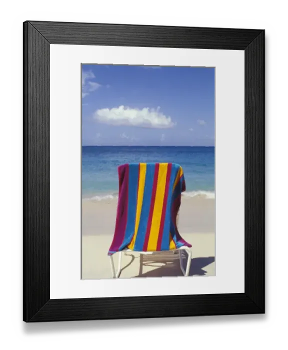 Framed Print : Caribbean, Grenada, Grand Anse beach. Beach towel on chair Framed Print : Caribbean, Grenada, Grand Anse beach. Beach towel on chair