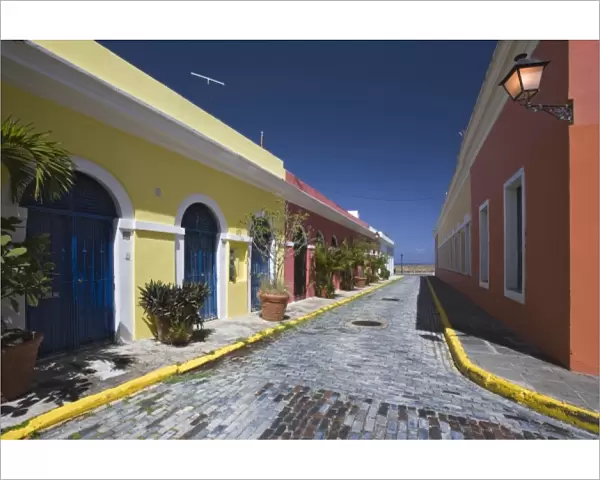 Caribbean, Puerto Rico, Old San Juan. Colorful houses on a cobblestone street