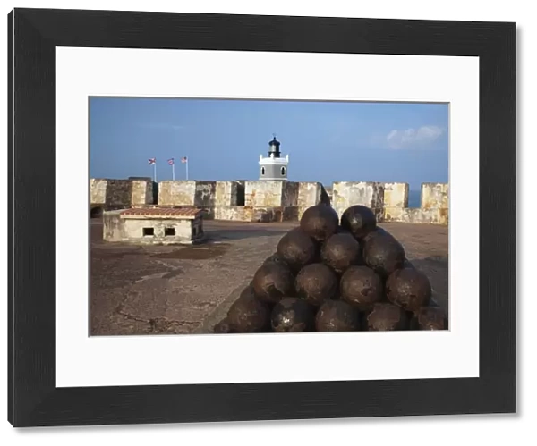 Caribbean, Puerto Rico, San Juan. Stacked canon balls at Fort San Cristobal