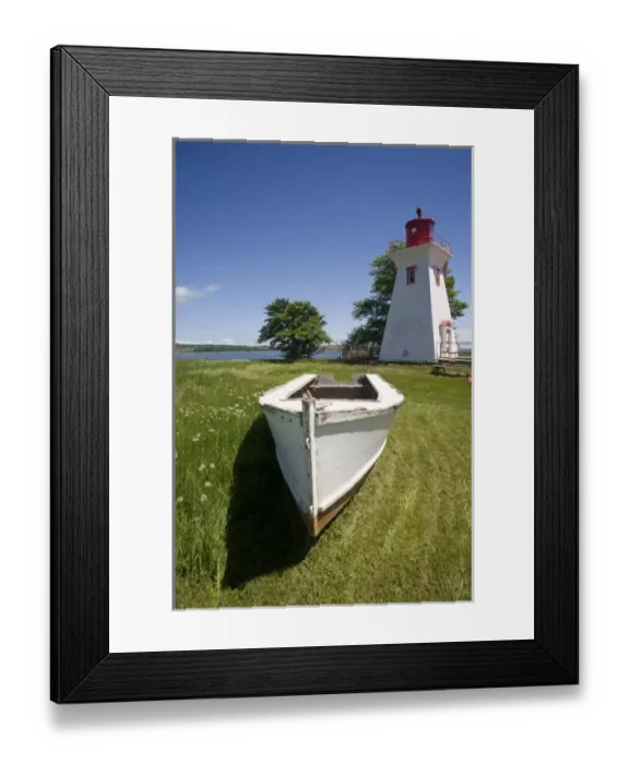 Framed Print : Canada, Prince Edward Island, Victoria. Lighthouse with maple leaf, and rescue boat Framed Print : Canada, Prince Edward Island, Victoria. Lighthouse with maple leaf, and rescue boat