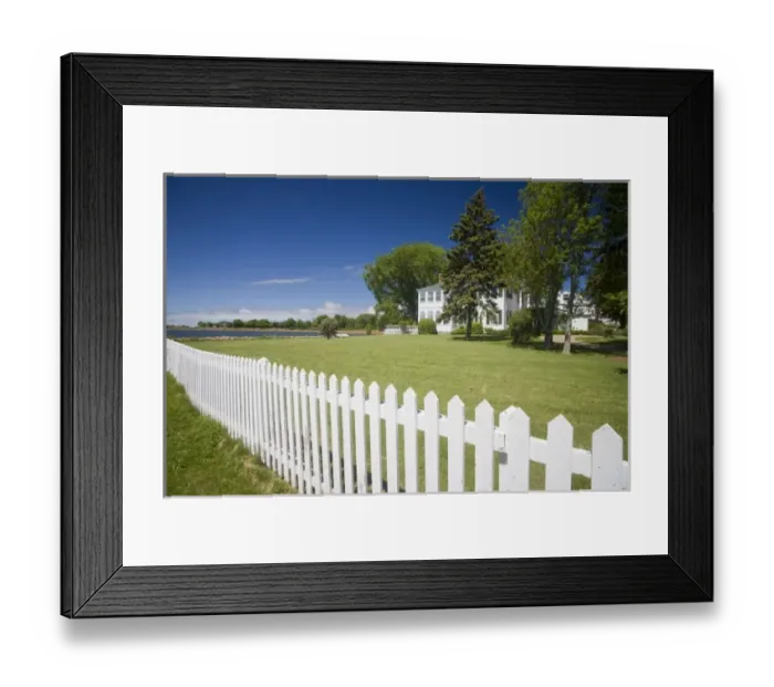 Framed Print : Canada, Prince Edward Island, Charlottetown. Historic waterfront house with white picket fence