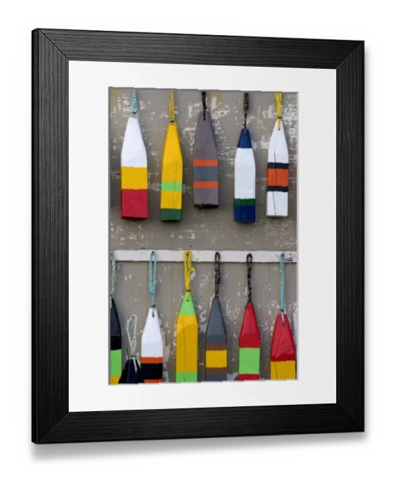 Framed Print : Lobster buoys hang on a wall at a village north of North Rustico on Prince Edward Island, Canada Framed Print : Lobster buoys hang on a wall at a village north of North Rustico on Prince Edward Island, Canada