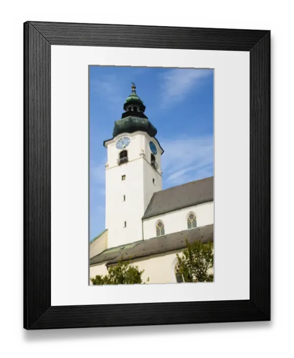 Framed Print : Wels, Upper Austria, Austria - Low angle view of a clock and bell tower of an old church Framed Print : Wels, Upper Austria, Austria - Low angle view of a clock and bell tower of an old church