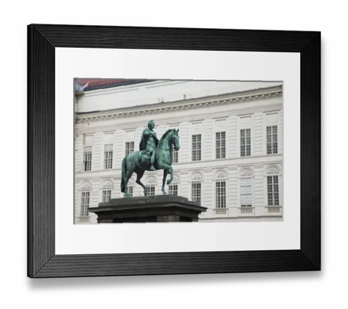 Framed Print : Austria, Vienna. Low angle view of a statue of a man on a horse. The statue is situated Framed Print : Austria, Vienna. Low angle view of a statue of a man on a horse. The statue is situated