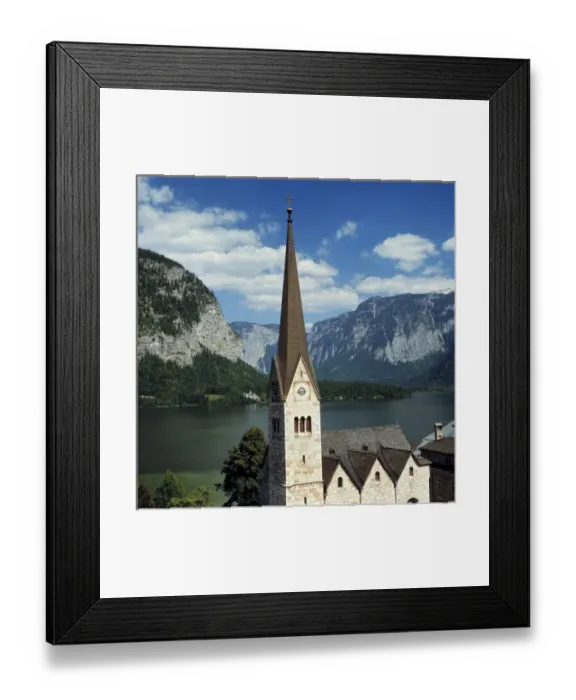 Framed Print : Europe, Austria, Hallstatt. The spire of this Hallstatt church can be seen for miles Framed Print : Europe, Austria, Hallstatt. The spire of this Hallstatt church can be seen for miles
