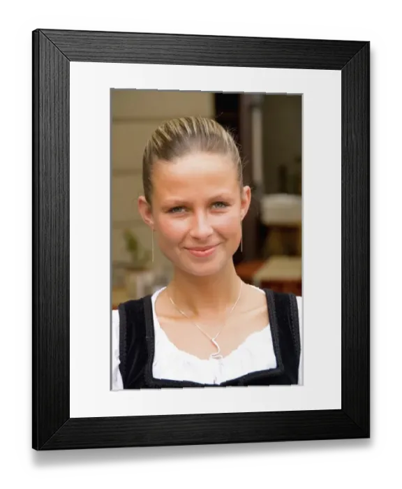 Framed Print : Close up of beautiful waitress in costume of tourist city of Cesky Krumlov in Czech Republic