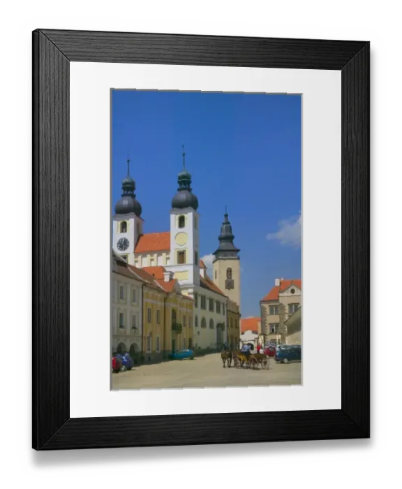 Framed Print : Church and castle in Old town square surrounded by 16th-century Renaissance houses Framed Print : Church and castle in Old town square surrounded by 16th-century Renaissance houses
