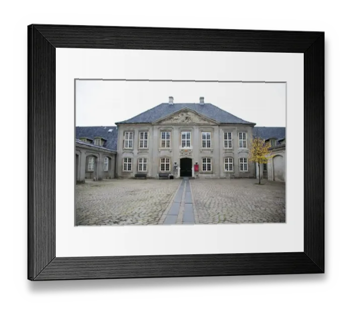 Framed Print : Copenhagen, Denmark - The facade of an old building with a brick courtyard in front Framed Print : Copenhagen, Denmark - The facade of an old building with a brick courtyard in front