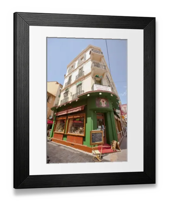 Framed Print : France, Provence, Cannes. Corner building with shop on first floor. Credit as: Fred Framed Print : France, Provence, Cannes. Corner building with shop on first floor. Credit as: Fred