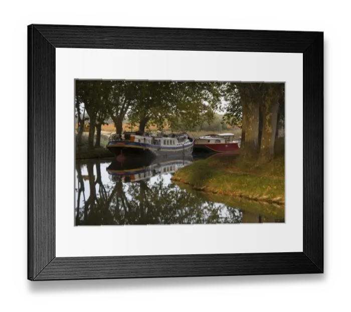 Framed Print : Barges tied up along bank of the Canal du Midi, Aude, Languedoc, France Framed Print : Barges tied up along bank of the Canal du Midi, Aude, Languedoc, France