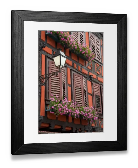 Framed Print : Red building with shuttered windows and flower boxes in the village of Ribeauville, Eastern France Framed Print : Red building with shuttered windows and flower boxes in the village of Ribeauville, Eastern France
