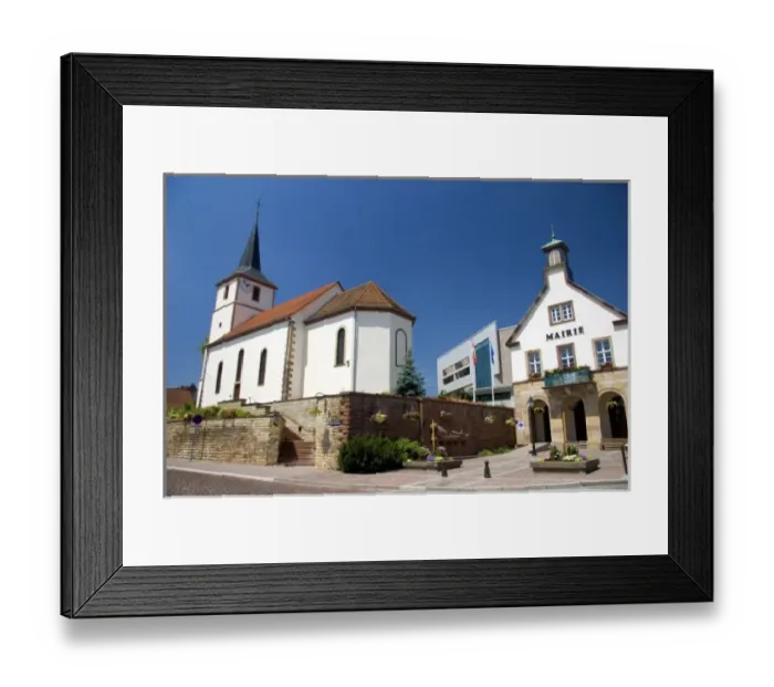 Framed Print : Protestant church and municipal offices at the village of Betschdorf, France Framed Print : Protestant church and municipal offices at the village of Betschdorf, France