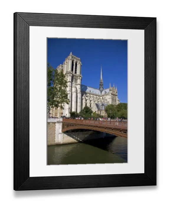 Framed Print : Notre Dame cathedral along the river Seine in Paris, France Framed Print : Notre Dame cathedral along the river Seine in Paris, France