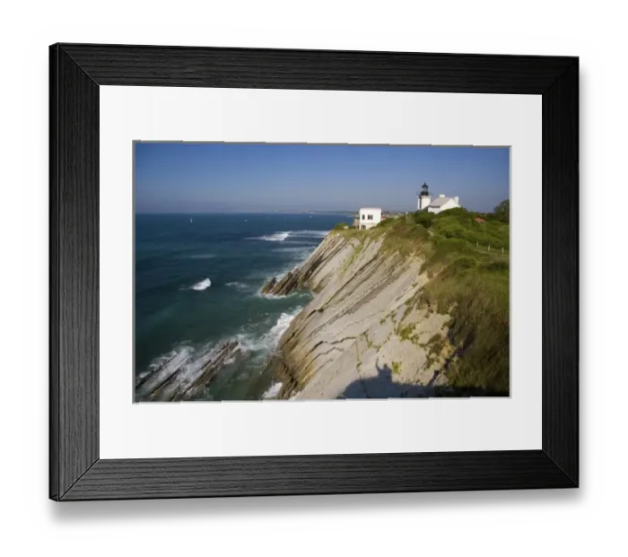 Framed Print : Coastal cliffs and lighthouse above the bay at Saint-Jean-de-Luz, French Basque Country Framed Print : Coastal cliffs and lighthouse above the bay at Saint-Jean-de-Luz, French Basque Country