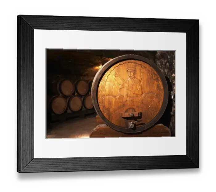 Framed Print : Wooden storage vat with aging wine of Guigal in Ampuis. The end of the vat is carved Framed Print : Wooden storage vat with aging wine of Guigal in Ampuis. The end of the vat is carved