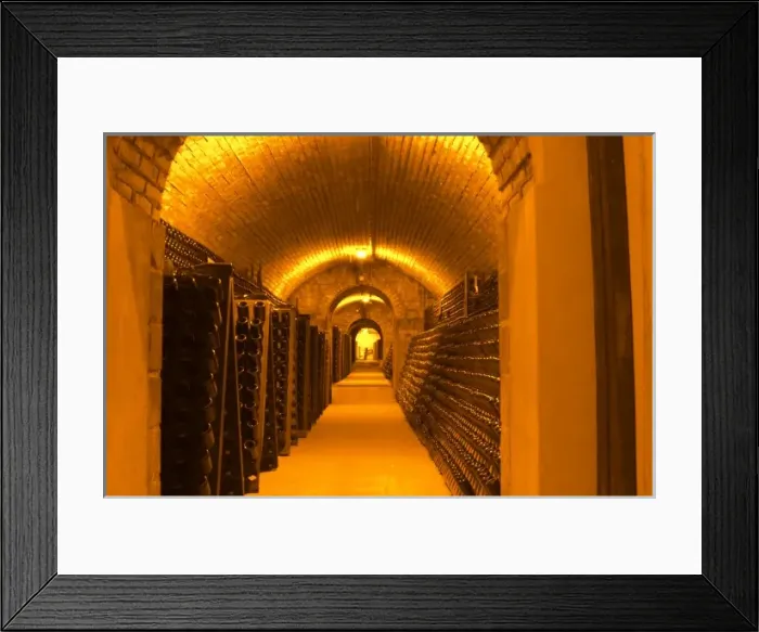 Framed Print : Bottles aging either in pupitres (racks) waiting for the secondary fermentation Framed Print : Bottles aging either in pupitres (racks) waiting for the secondary fermentation