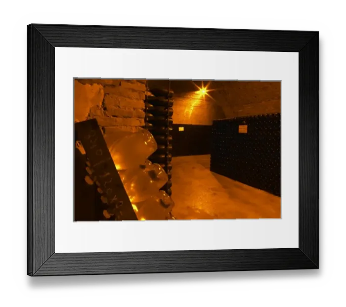 Framed Print : Wine cellar that is an old chalk quarry. A rack (pupitre) with bottles for the prestige Framed Print : Wine cellar that is an old chalk quarry. A rack (pupitre) with bottles for the prestige