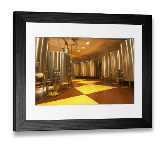 Framed Print : The winery, stainless steel fermentation tanks in a round building - Chateau Baron