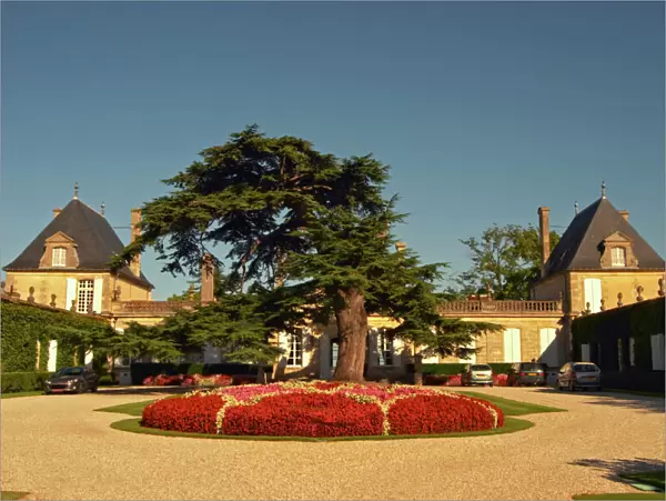 The court yard to Chateau Beychevelle in Saint Julien. Beautiful flower arrangements