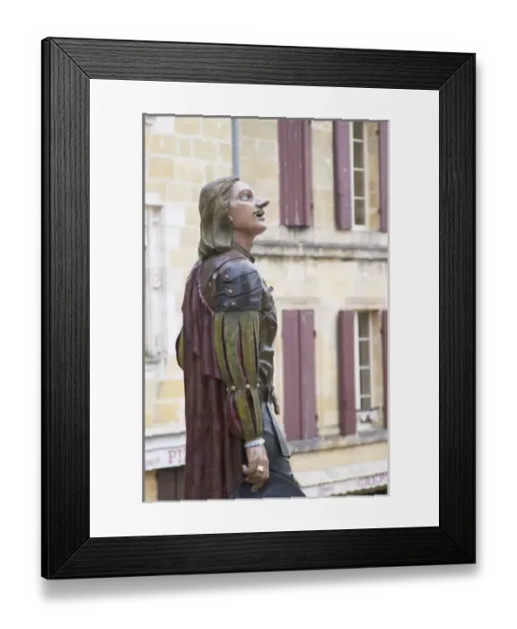 Framed Print : Statue of Cyrano de Bergerac on the main town square in Bergerac, it is painted in colour Framed Print : Statue of Cyrano de Bergerac on the main town square in Bergerac, it is painted in colour
