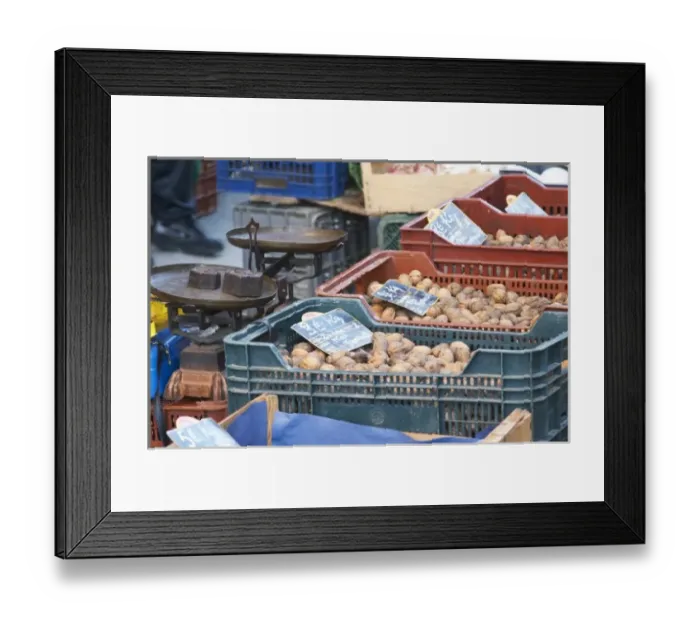 Framed Print : Walnuts for sale in plastic ctrates baskets at a market stall at the market in Bergerac