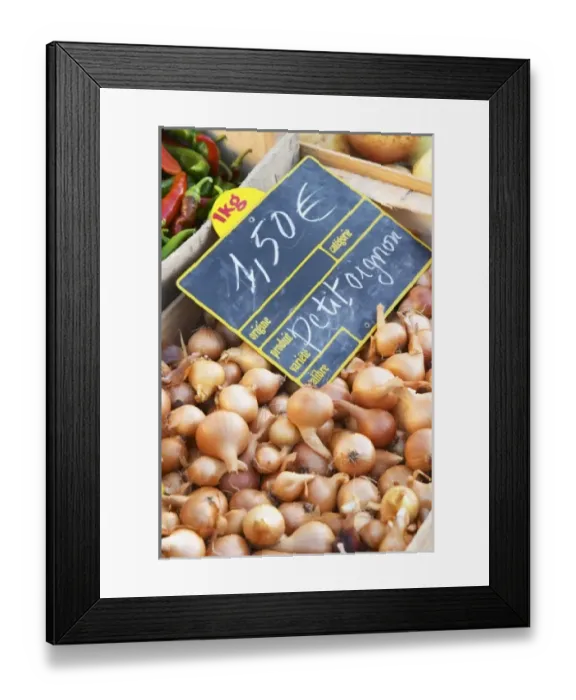 Framed Print : Small onions, 1. 50 euro per kilo, for sale at a market stall at the street market in Bergerac Framed Print : Small onions, 1. 50 euro per kilo, for sale at a market stall at the street market in Bergerac