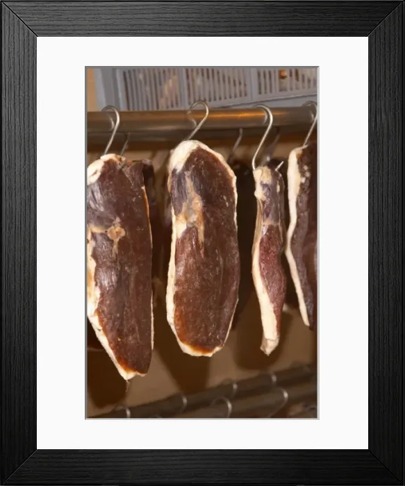 Framed Print : Ducks breast (magret or filet de canard) hanging on hooks in a temperature controlled Framed Print : Ducks breast (magret or filet de canard) hanging on hooks in a temperature controlled