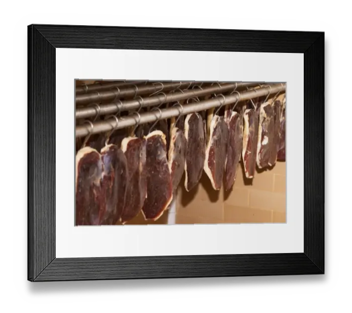 Framed Print : Ducks breast (magret or filet de canard) hanging on hooks in a temperature controlled Framed Print : Ducks breast (magret or filet de canard) hanging on hooks in a temperature controlled