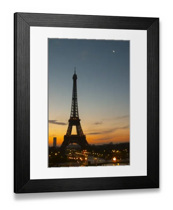Framed Print : The Eiffel Tower in Paris in early morning, pale blue sky some white clouds Framed Print : The Eiffel Tower in Paris in early morning, pale blue sky some white clouds