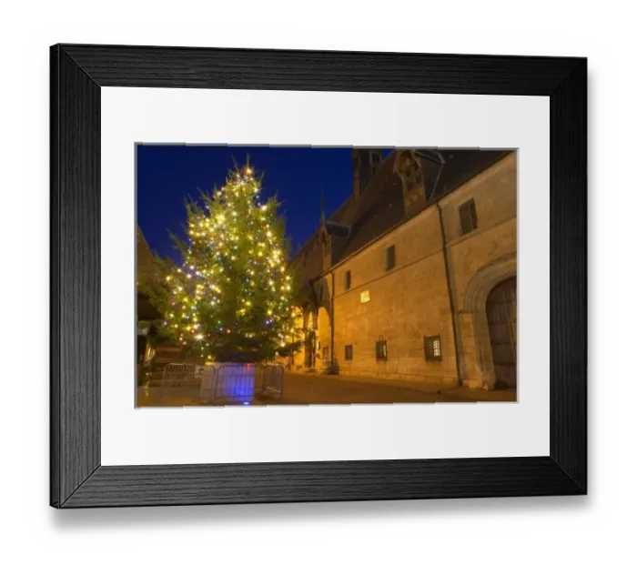 Framed Print : A chrstmas tree with coloured colored lights in front of the Hotel Dieu Hospices Framed Print : A chrstmas tree with coloured colored lights in front of the Hotel Dieu Hospices