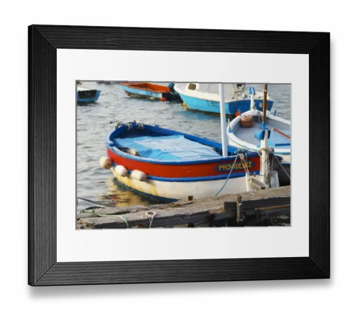 Framed Print : Typical Provencal fishing boats painted in bright colours white, blue, green red yellow Framed Print : Typical Provencal fishing boats painted in bright colours white, blue, green red yellow