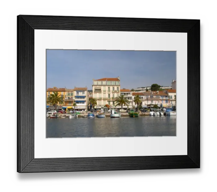 Framed Print : The harbour with boats and buildings along the water in Bandol Bandol Cote d Azur