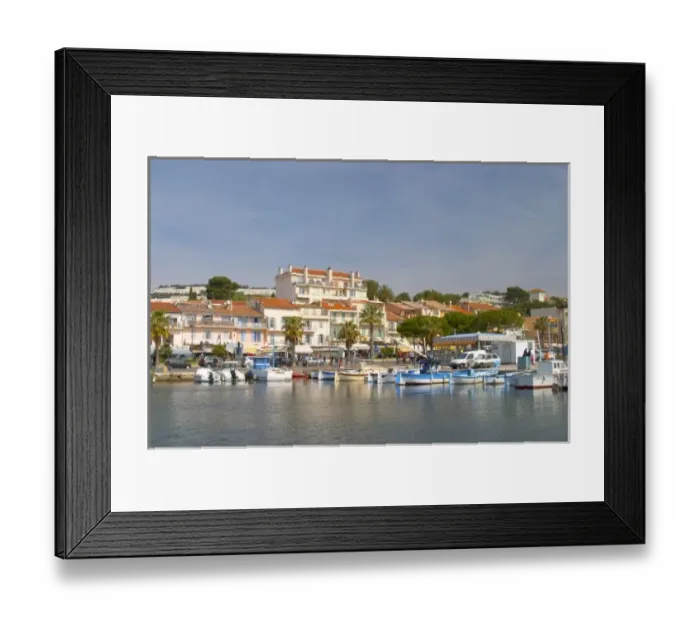 Framed Print : The harbour with boats and buildings along the water in Bandol Bandol Cote d Azur