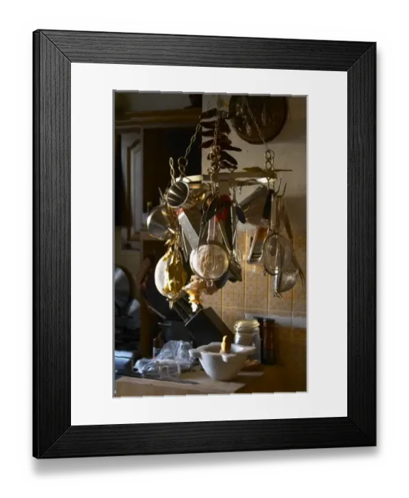 Framed Print : Kitchen utensils hanging on hooks in the Provence kitchen: raper, stainer, sieves Framed Print : Kitchen utensils hanging on hooks in the Provence kitchen: raper, stainer, sieves